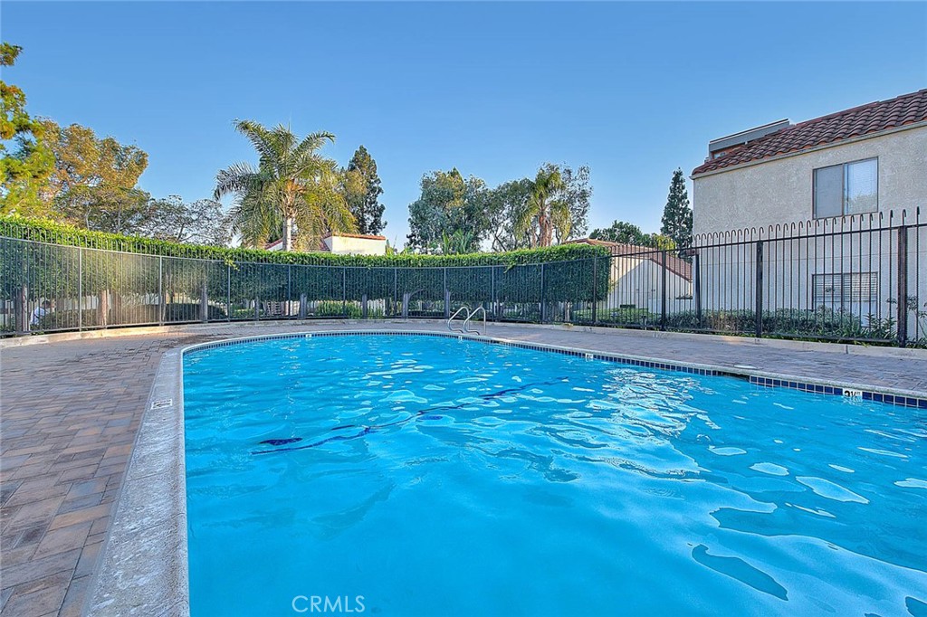 700 West 3rd Street, Unit A111 Santa Ana, CA 92701 - Photo 11 of 15 a view of swimming pool with deck and yard