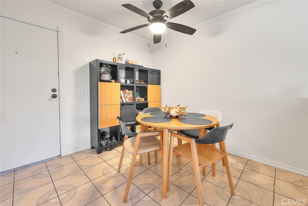 700 West 3rd Street, Unit A111 Santa Ana, CA 92701 - Photo 4 of 15 a view of a dining room with furniture and chandelier
