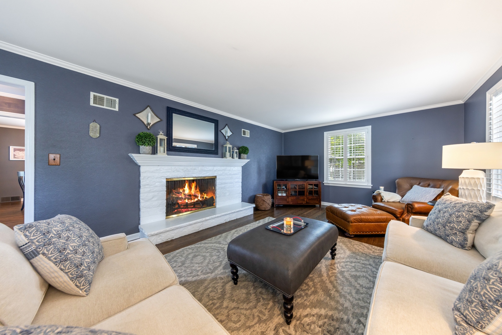 2430 Covert Road Glenview, IL 60025 - Photo 3 of 26 a living room with furniture and a fireplace