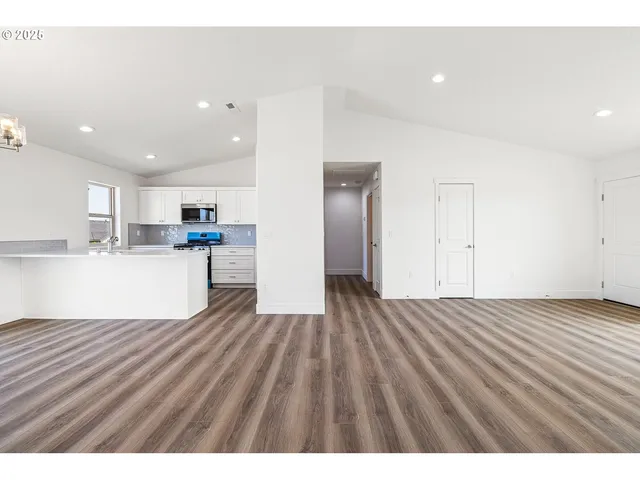 a view of kitchen with wooden floor