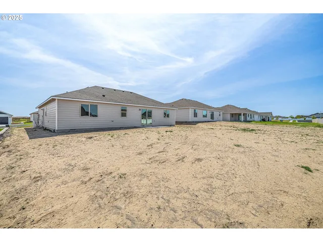 a view of wooden house and ocean view