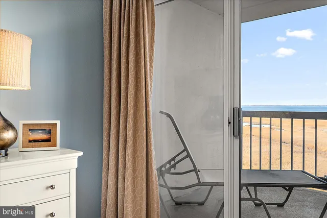 a room with furniture and a window