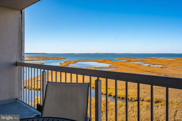 a view of staircase with wooden floor