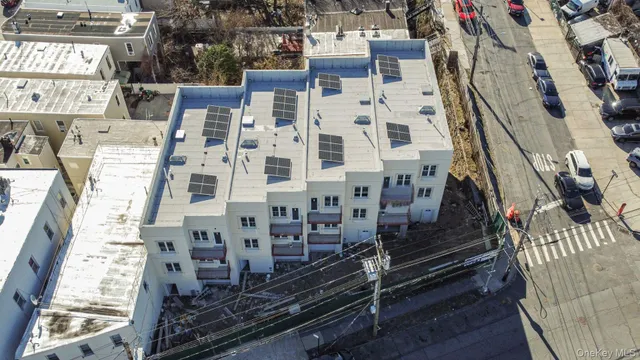 a view of a buildings with many windows