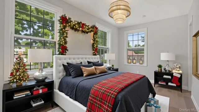 a bedroom with bed and a window