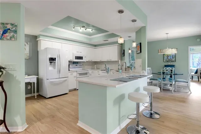 $339,000 | 2820 Citrus Lake Drive, Unit T101, Naples, FL 34109