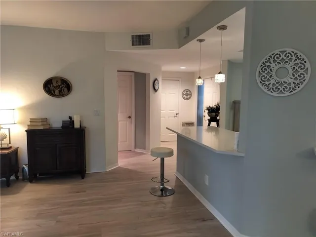 $339,000 | 2820 Citrus Lake Drive, Unit T101, Naples, FL 34109