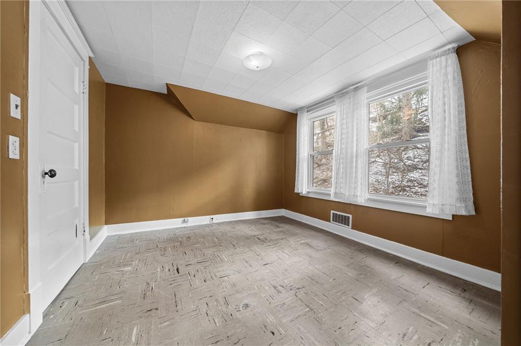 1341 Scrubgrass Road Carnegie, PA 15106 - Photo 14 of 21 a view of an empty room with a window