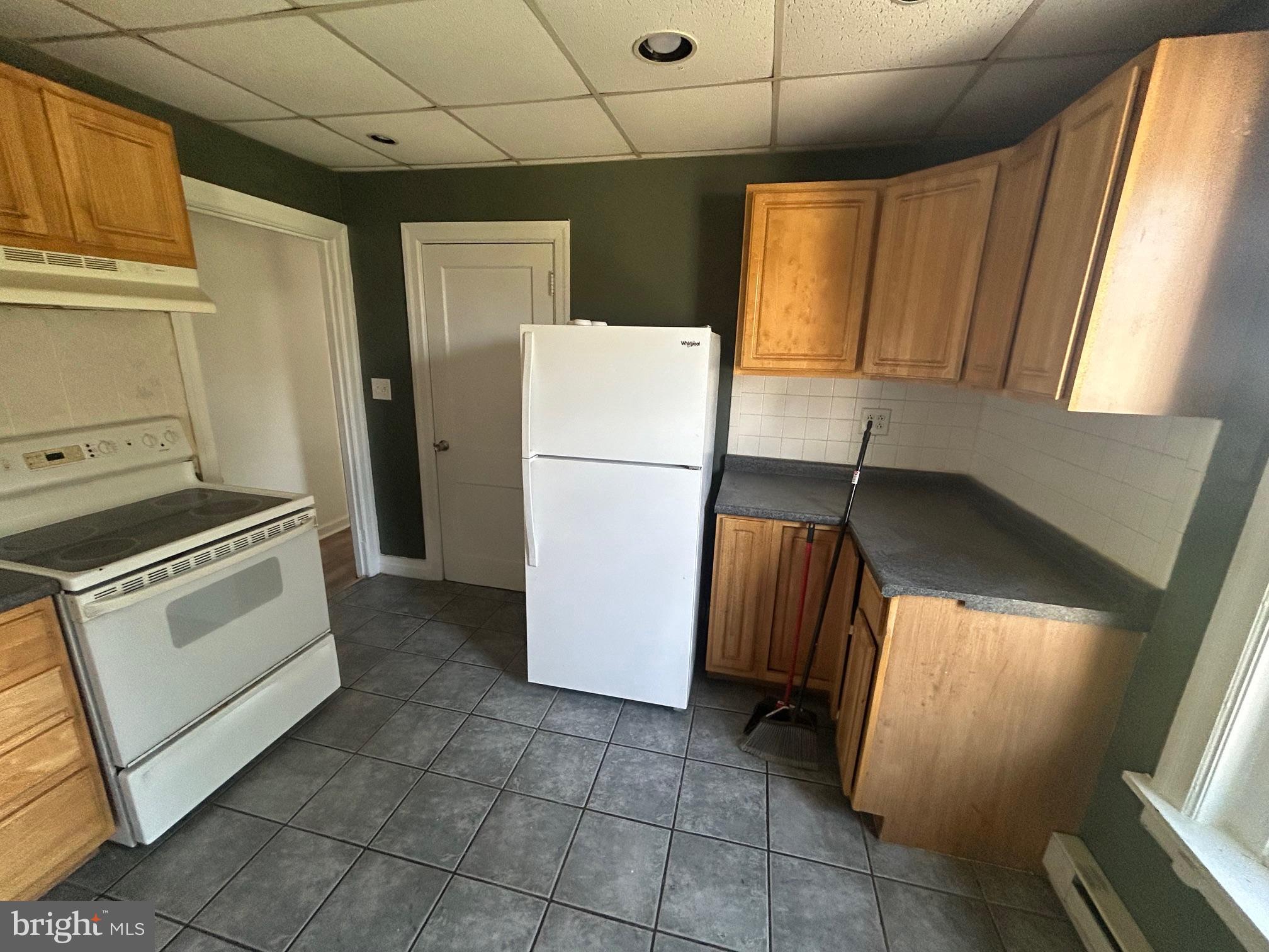 5 East Maple Street, Unit 2 Lebanon, PA 17046 - Photo 1 of 10 a kitchen with a refrigerator and a stove