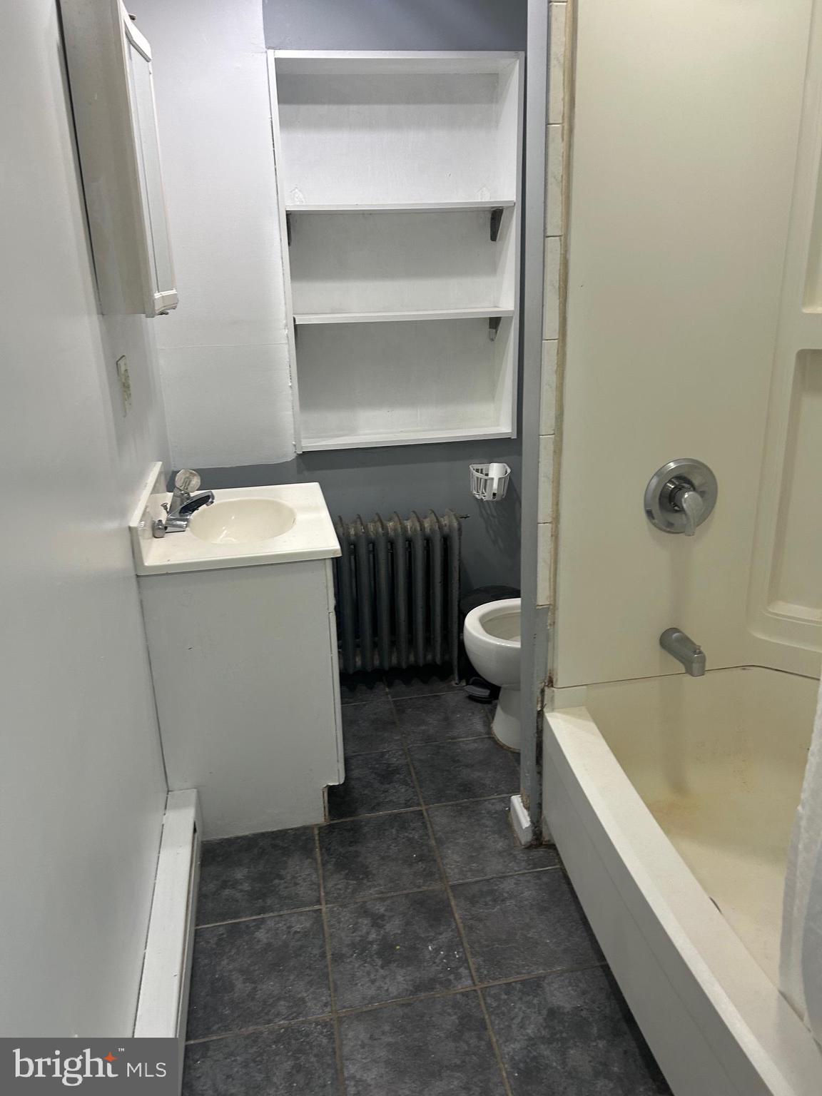 5 East Maple Street, Unit 2 Lebanon, PA 17046 - Photo 4 of 10 a bathroom with a sink and toilet