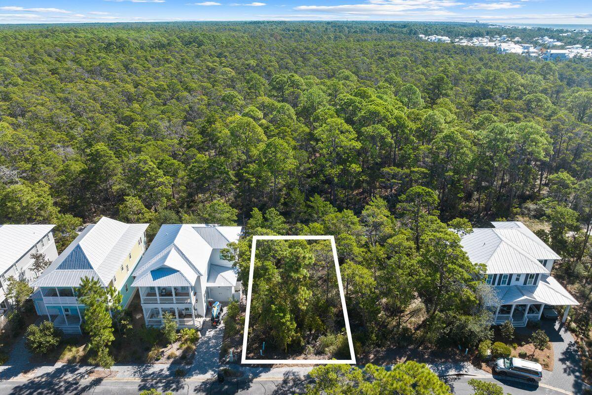 Lot 4 Matt's Way Santa Rosa Beach, FL 32459 - Photo 4 of 17 an aerial view of residential houses with outdoor space and trees