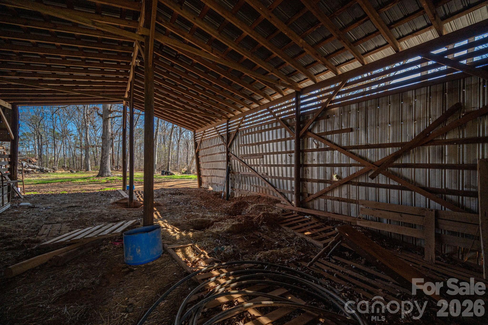 221 Lee Black Road Cherryville, NC 28021 - Photo 17 of 48 a view of a backyard of a house