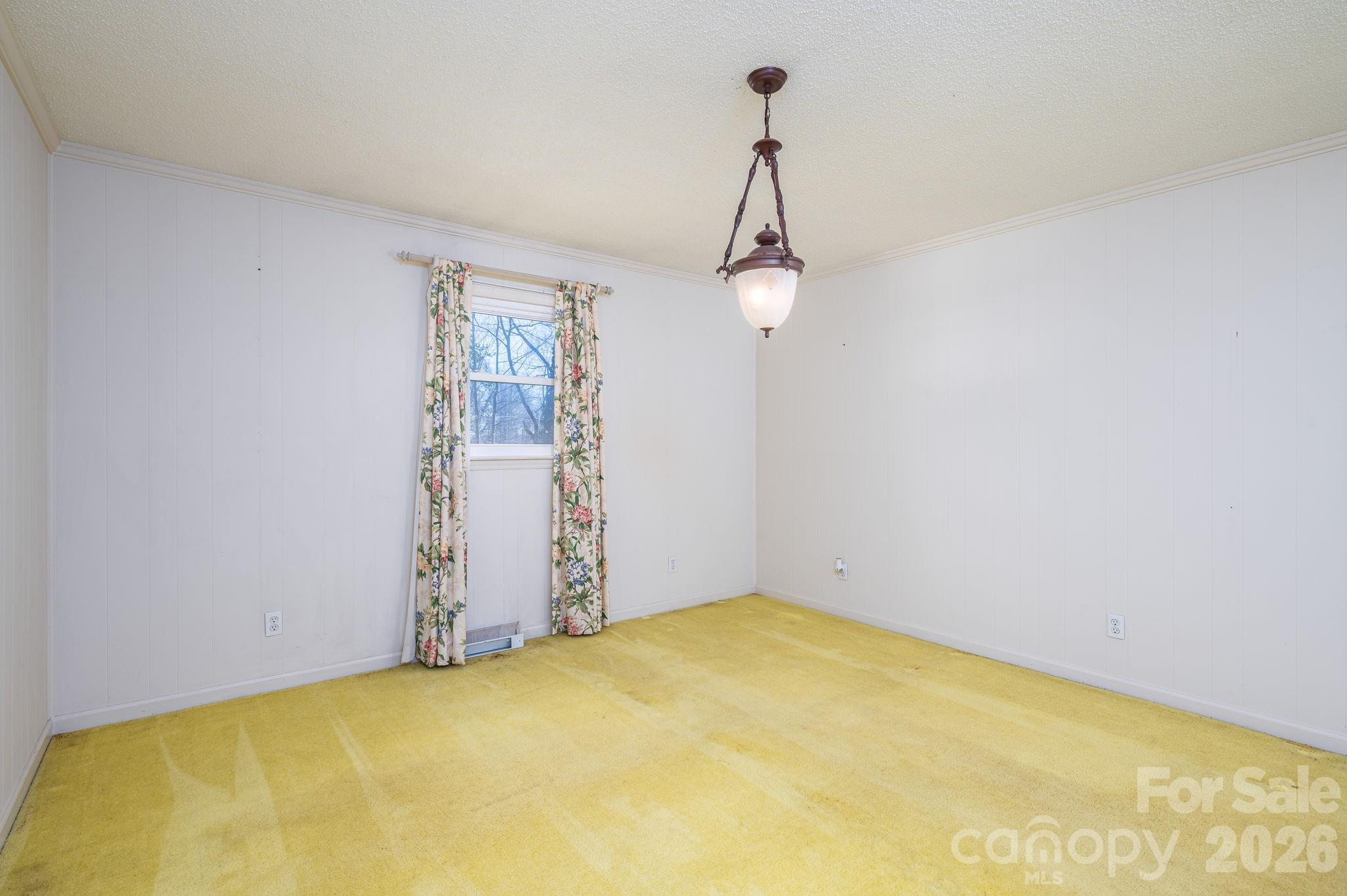 221 Lee Black Road Cherryville, NC 28021 - Photo 17 of 48 a view of a room with rack on the wall