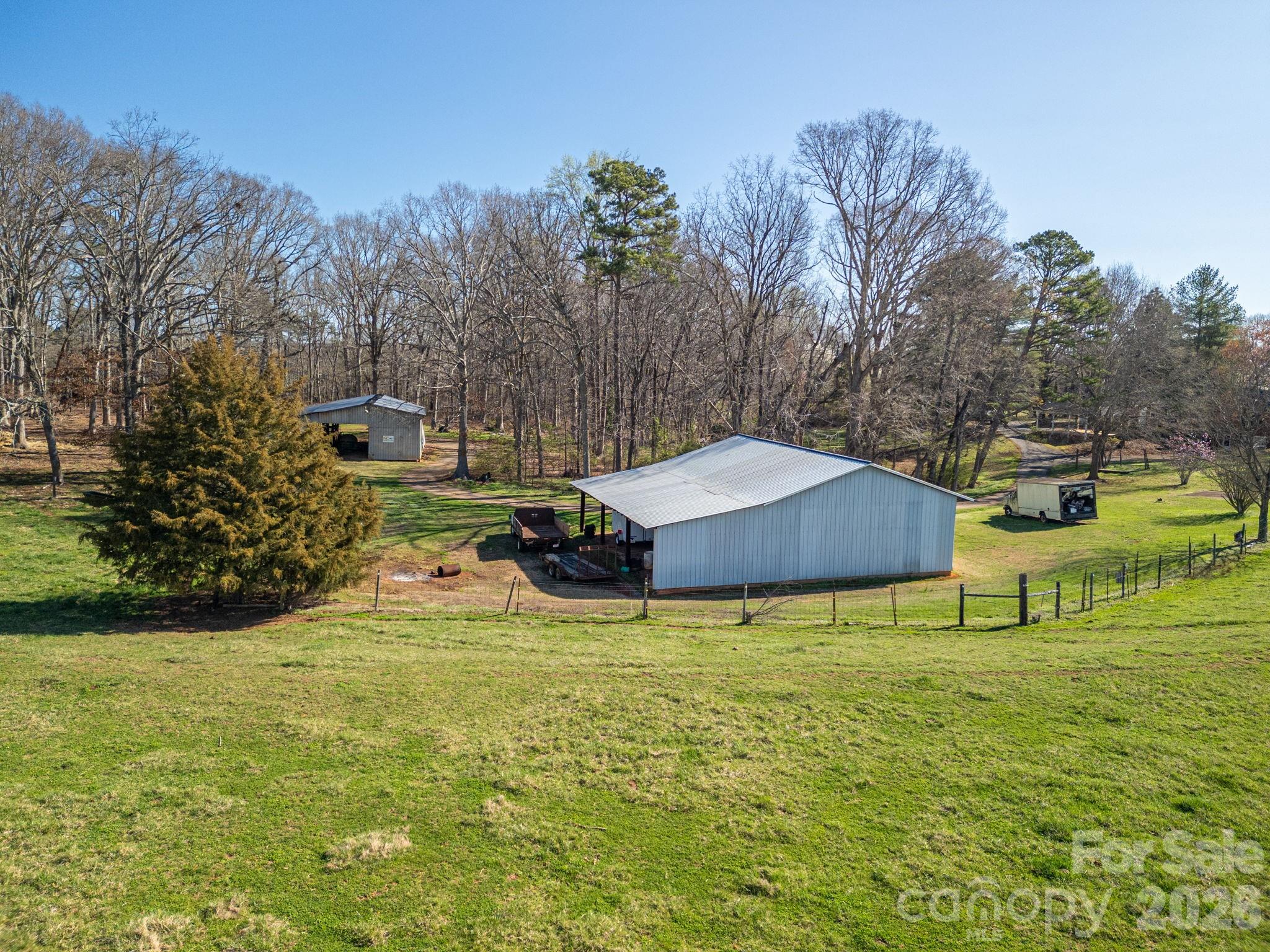 221 Lee Black Road Cherryville, NC 28021 - Photo 39 of 48 a view of a house with yard and swimming pool