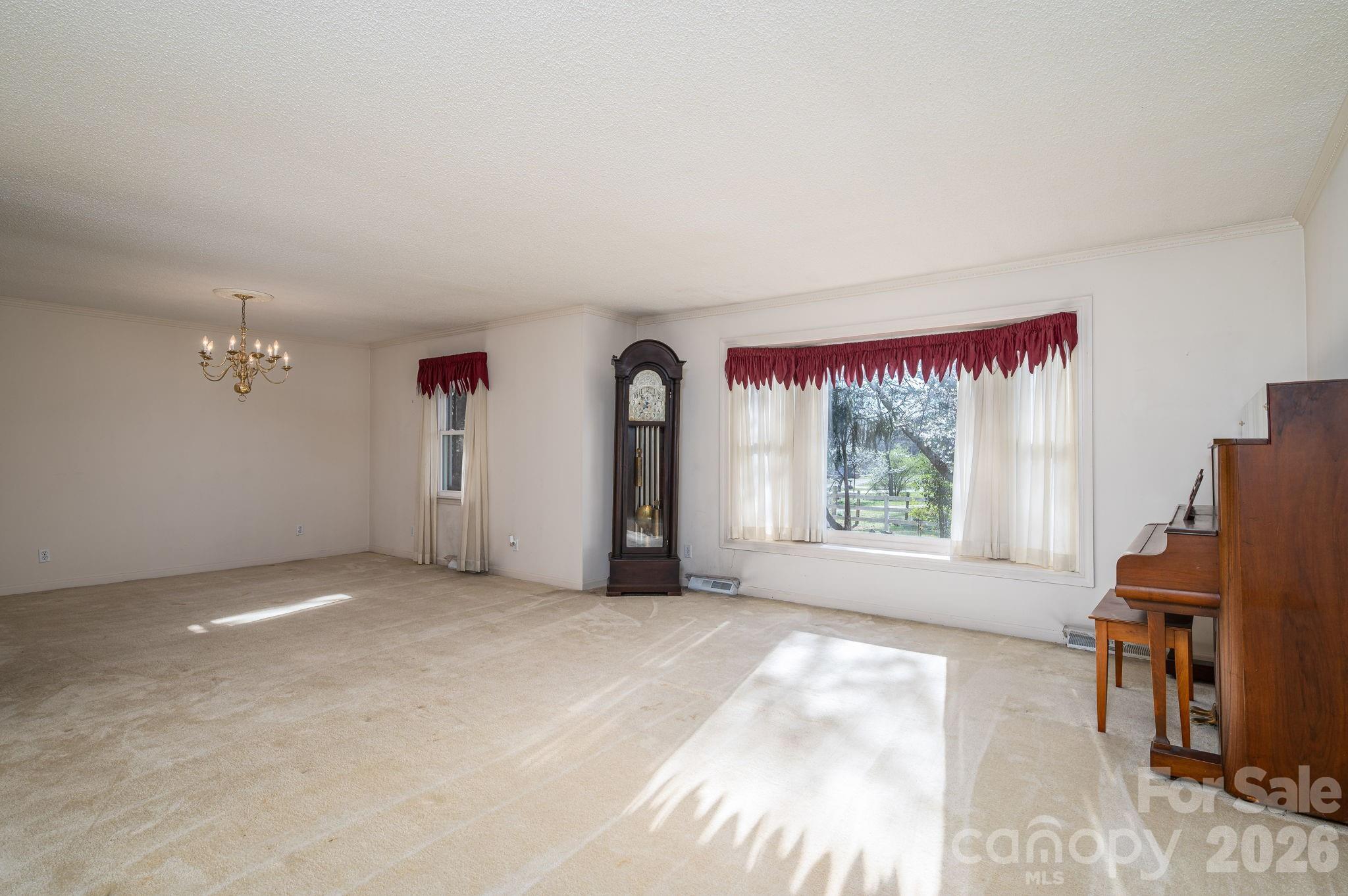 221 Lee Black Road Cherryville, NC 28021 - Photo 8 of 48 a view of an empty room with a window