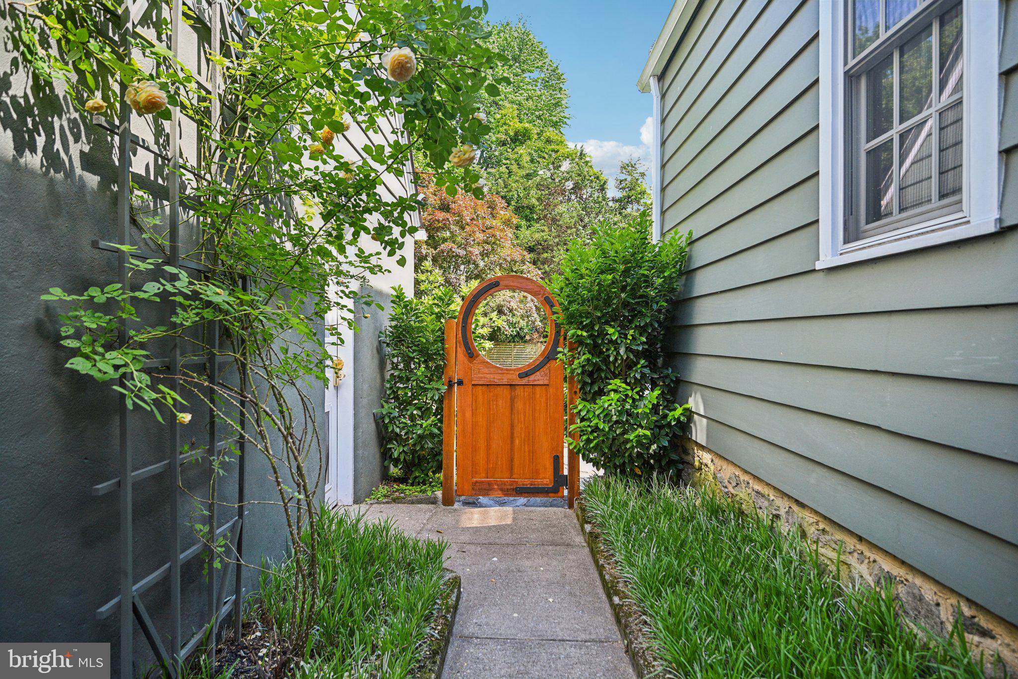 835 Beechwood Road Havertown, PA 19083 - Photo 54 of 66 Breezeway and gate-garage on left