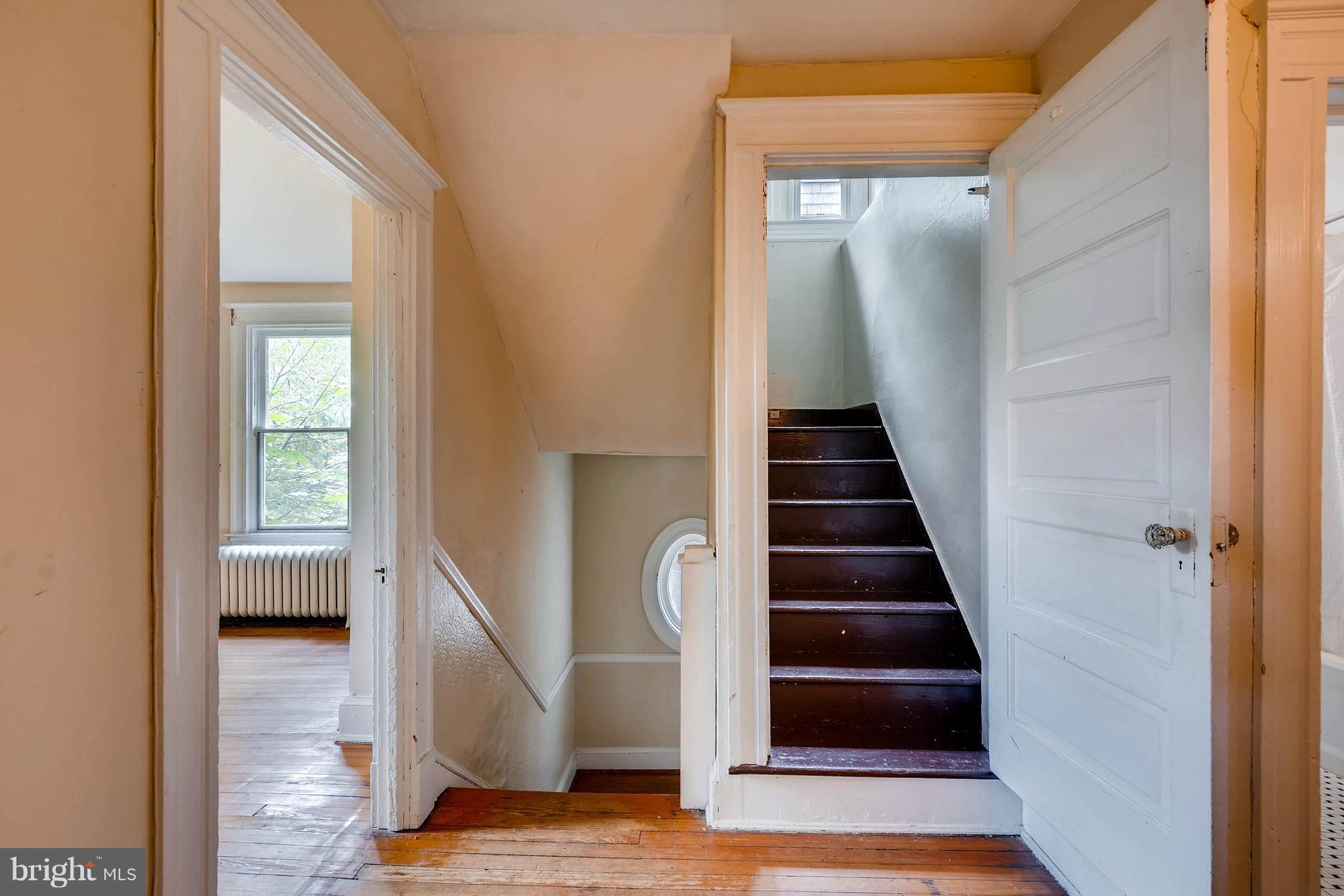 4835 Keswick Road Baltimore, MD 21210 - Photo 22 of 30 a view of entryway and hall with wooden floor