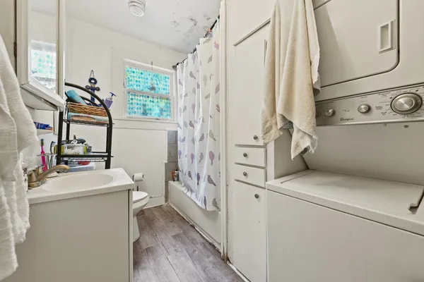 a utility room with dryer and washer
