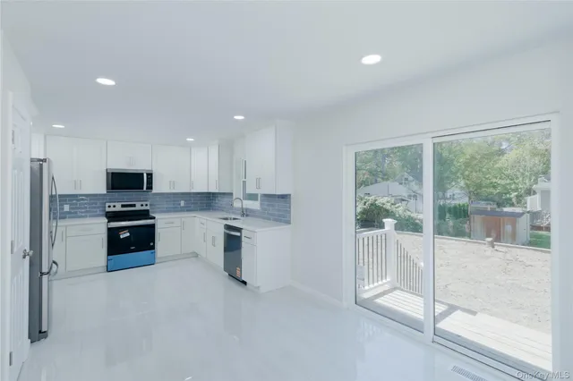 $549,990 | 108 McKinley Drive, Mastic Beach, NY 11951