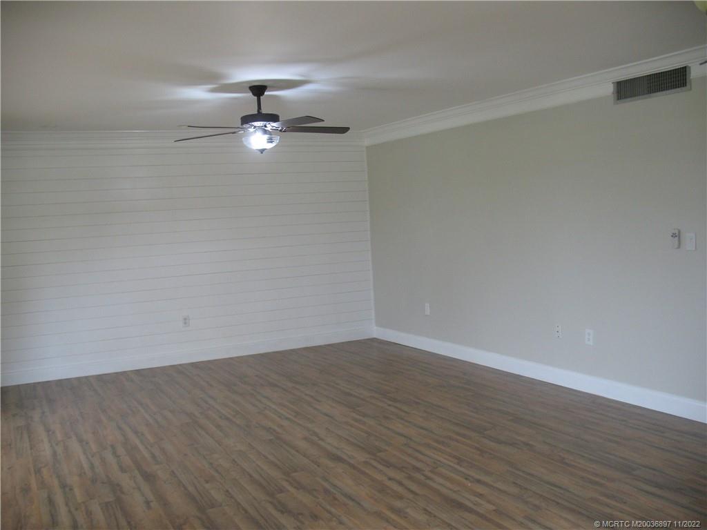 5393 Southeast Miles Grant Road, Unit A103 Stuart, FL 34997 - Photo 8 of 20 Living Room