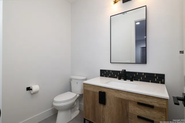 a bathroom with a sink and a toilet