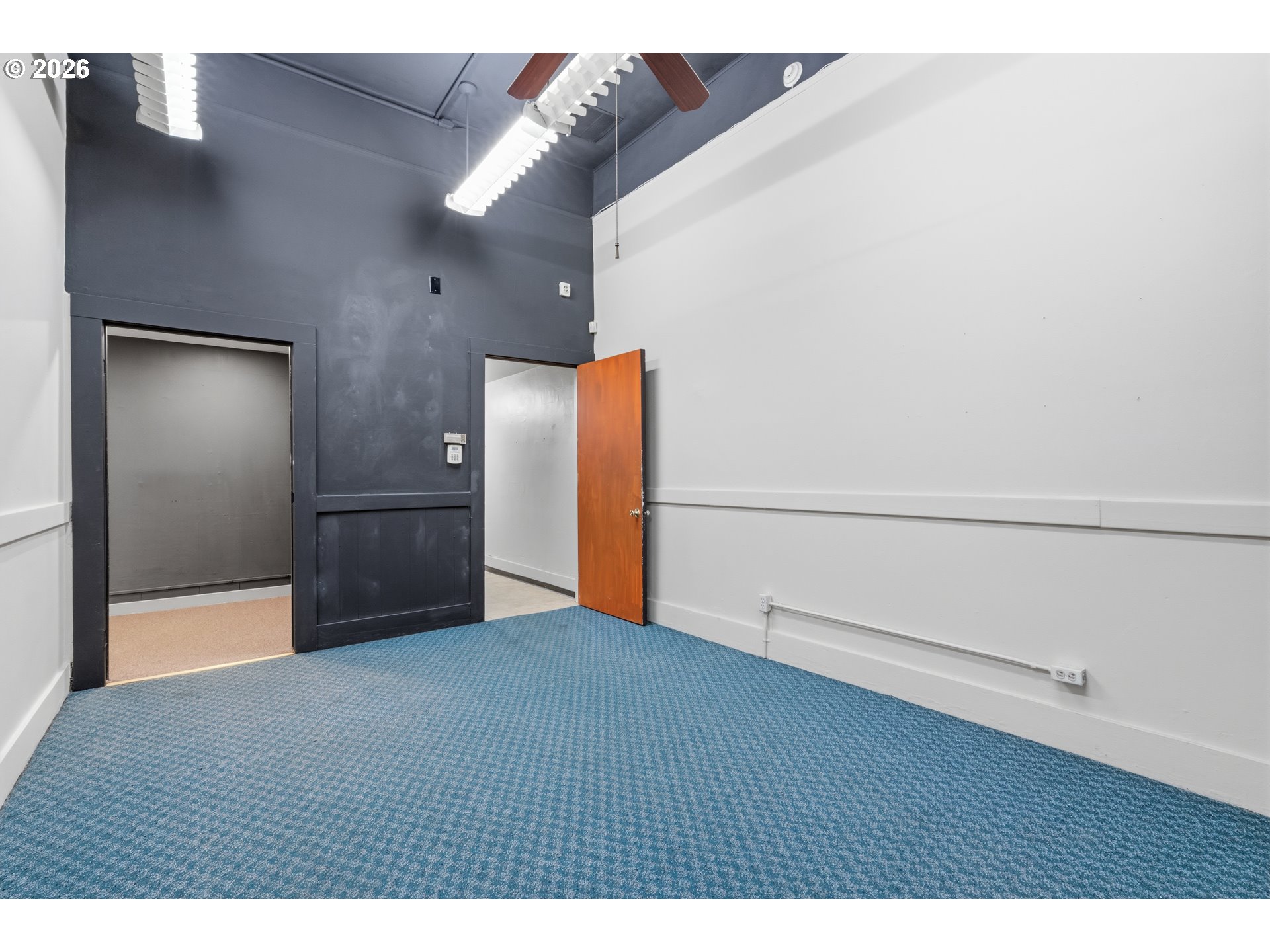 309 West 1st Avenue Albany, OR 97321 - Photo 12 of 39 a view of an empty room with wooden floor