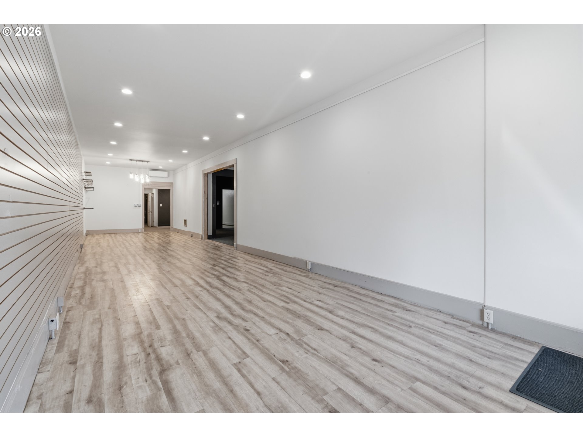 309 West 1st Avenue Albany, OR 97321 - Photo 7 of 39 en empty room with wooden floor