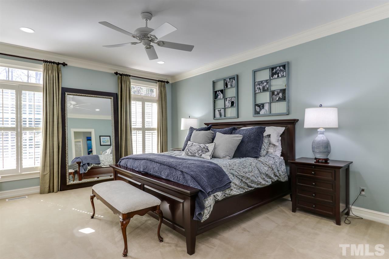 3329 Harden Road Raleigh, NC 27607 - Photo 14 of 29 a spacious bedroom with a bed and window