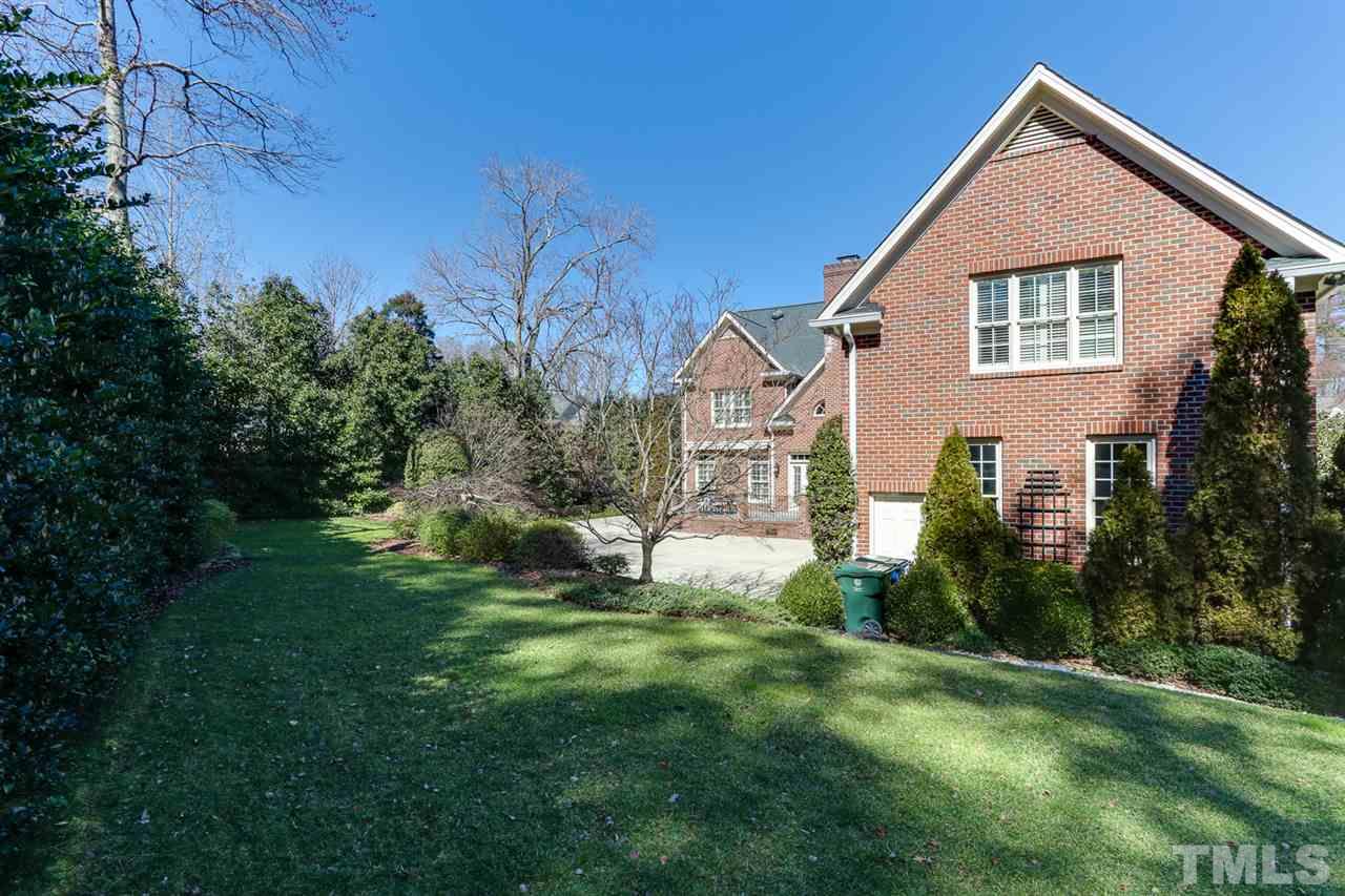 3329 Harden Road Raleigh, NC 27607 - Photo 29 of 29 a view of a house with a yard