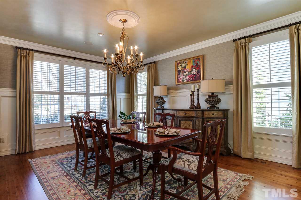 3329 Harden Road Raleigh, NC 27607 - Photo 6 of 29 a view of a dining room with furniture window and wooden floor