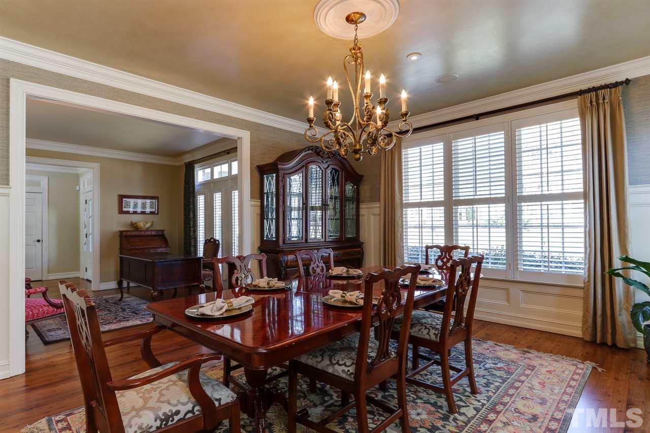 3329 Harden Road Raleigh, NC 27607 - Photo 7 of 29 a view of a dining room with furniture window and wooden floor