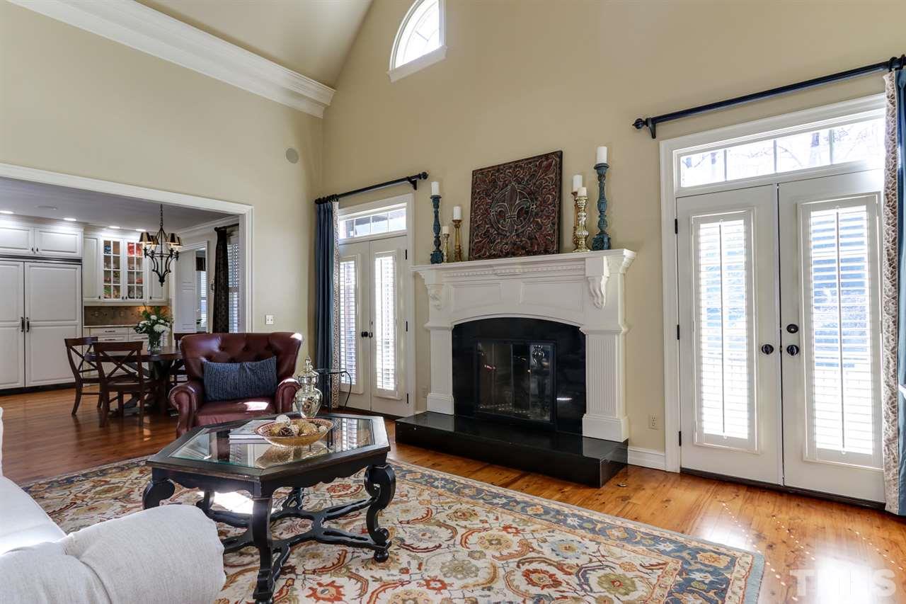 3329 Harden Road Raleigh, NC 27607 - Photo 8 of 29 a living room with furniture and a fireplace