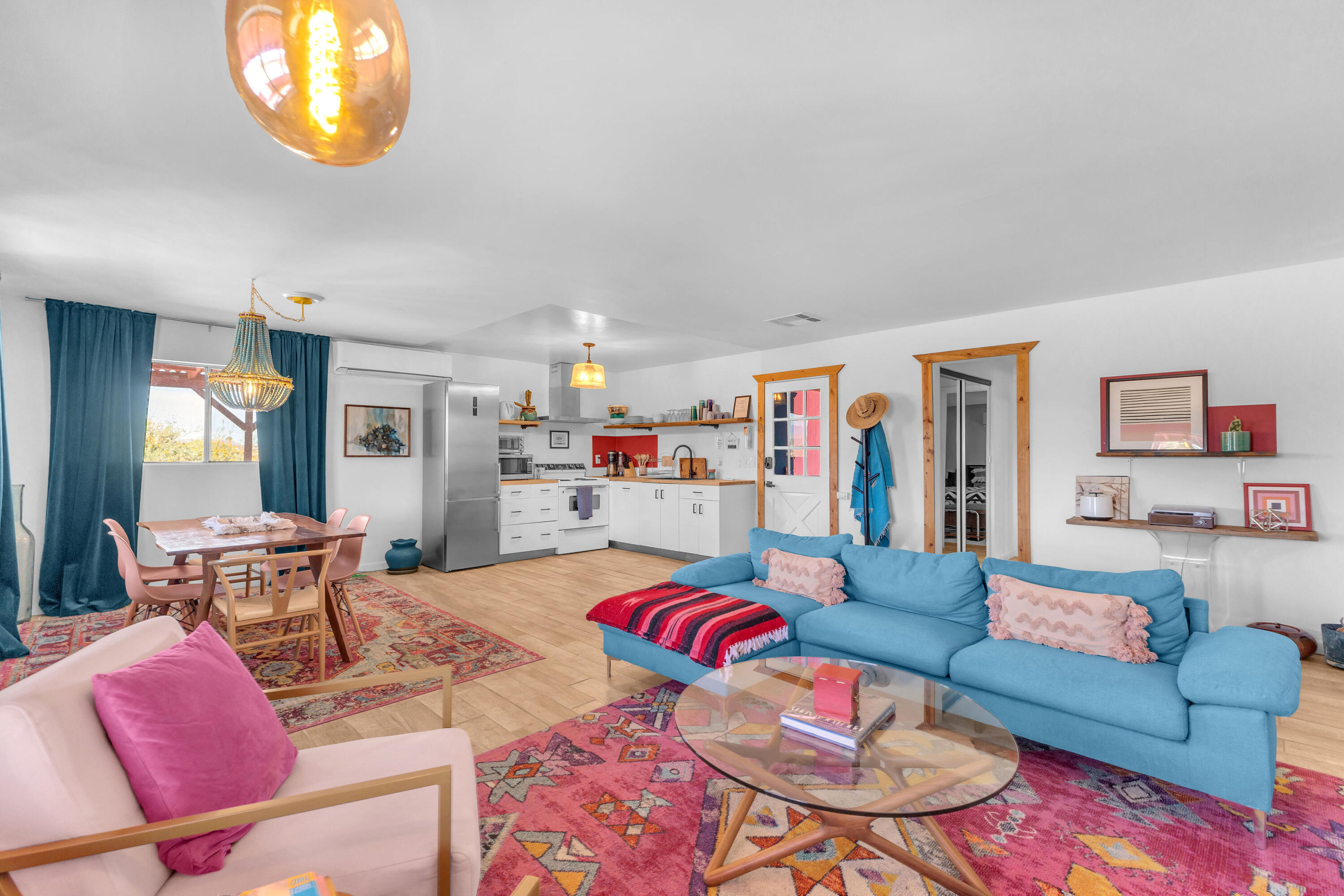 2642 Star Lane Joshua Tree, CA 92252 - Photo 11 of 76 a living room with furniture and a dining table
