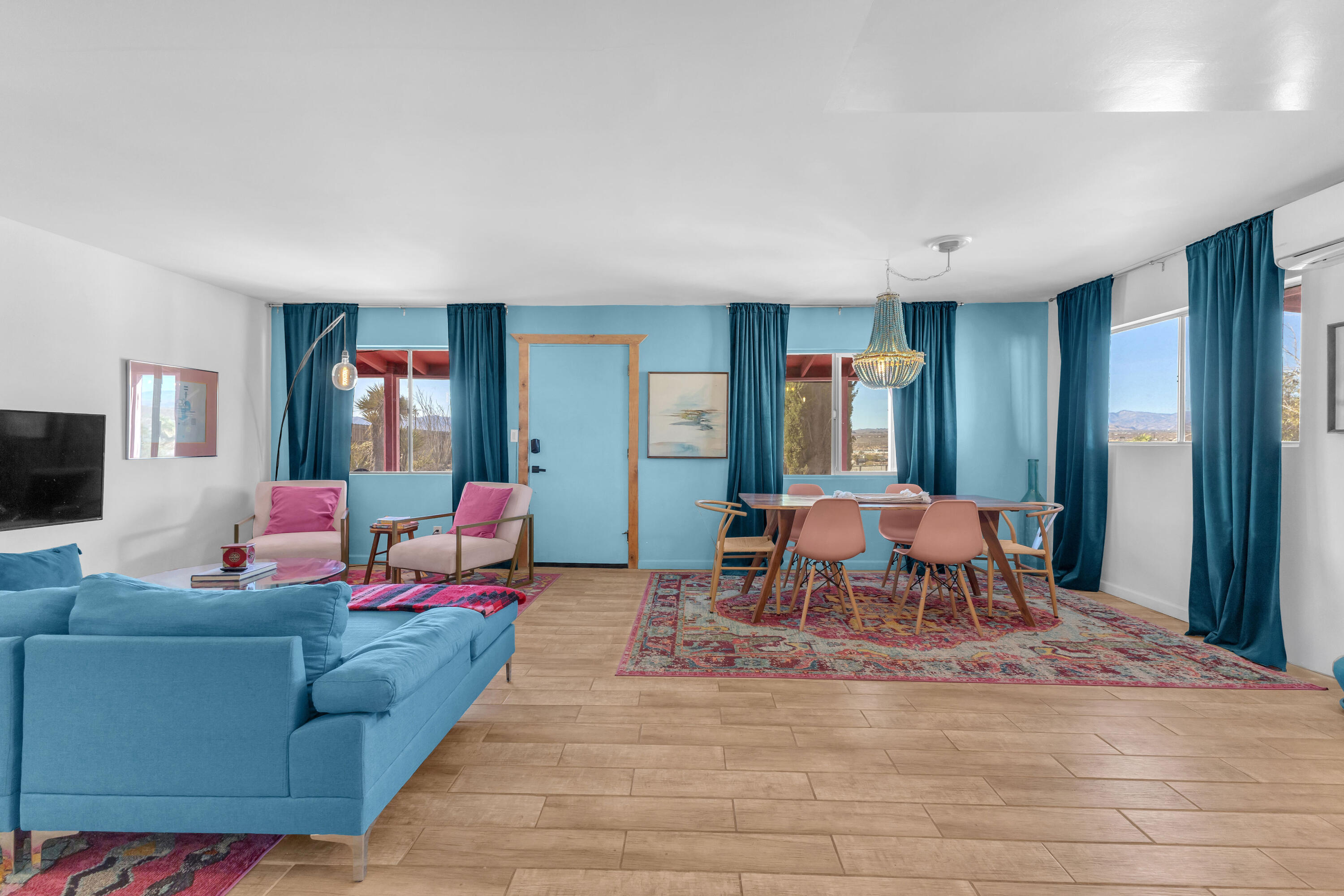 2642 Star Lane Joshua Tree, CA 92252 - Photo 12 of 76 a living room with furniture and a flat screen tv