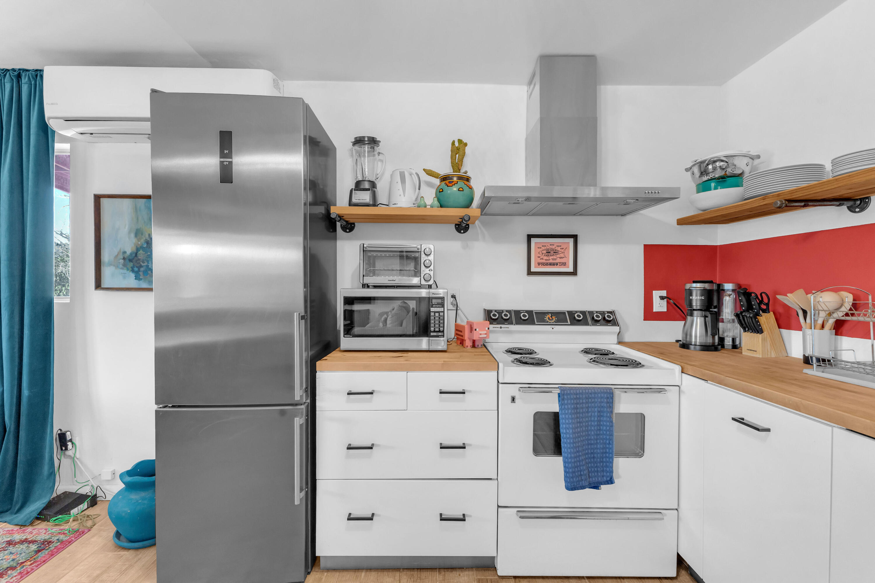 2642 Star Lane Joshua Tree, CA 92252 - Photo 17 of 76 a kitchen with stainless steel appliances a refrigerator and a stove