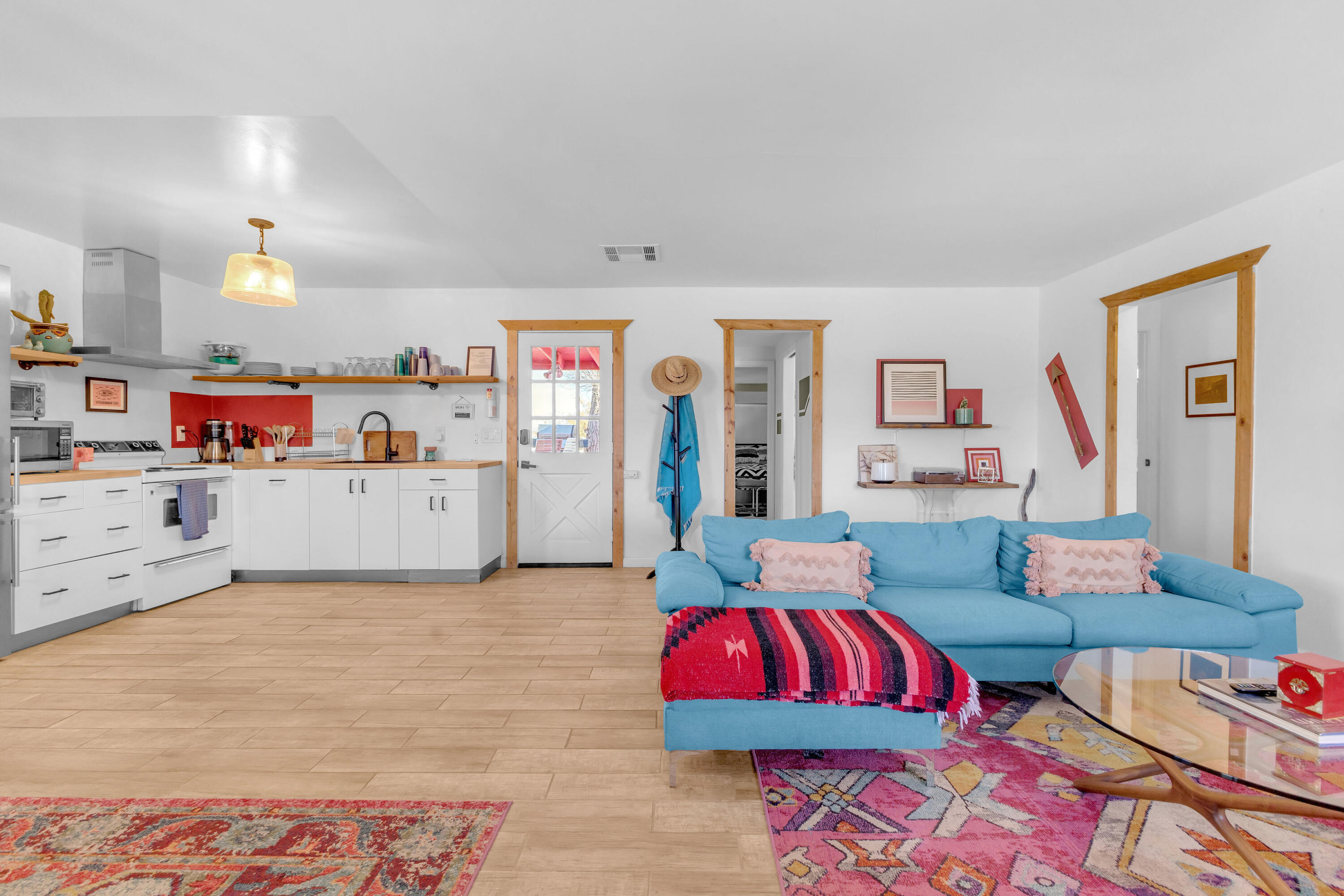 2642 Star Lane Joshua Tree, CA 92252 - Photo 19 of 76 a living room with furniture fireplace and dresser