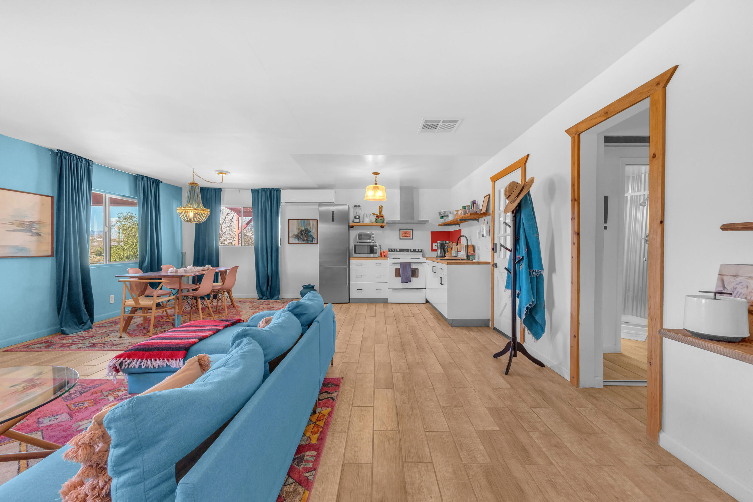 2642 Star Lane Joshua Tree, CA 92252 - Photo 20 of 76 a living room with furniture and a flat screen tv