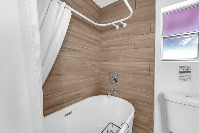 a view of a chairs and tables in patio