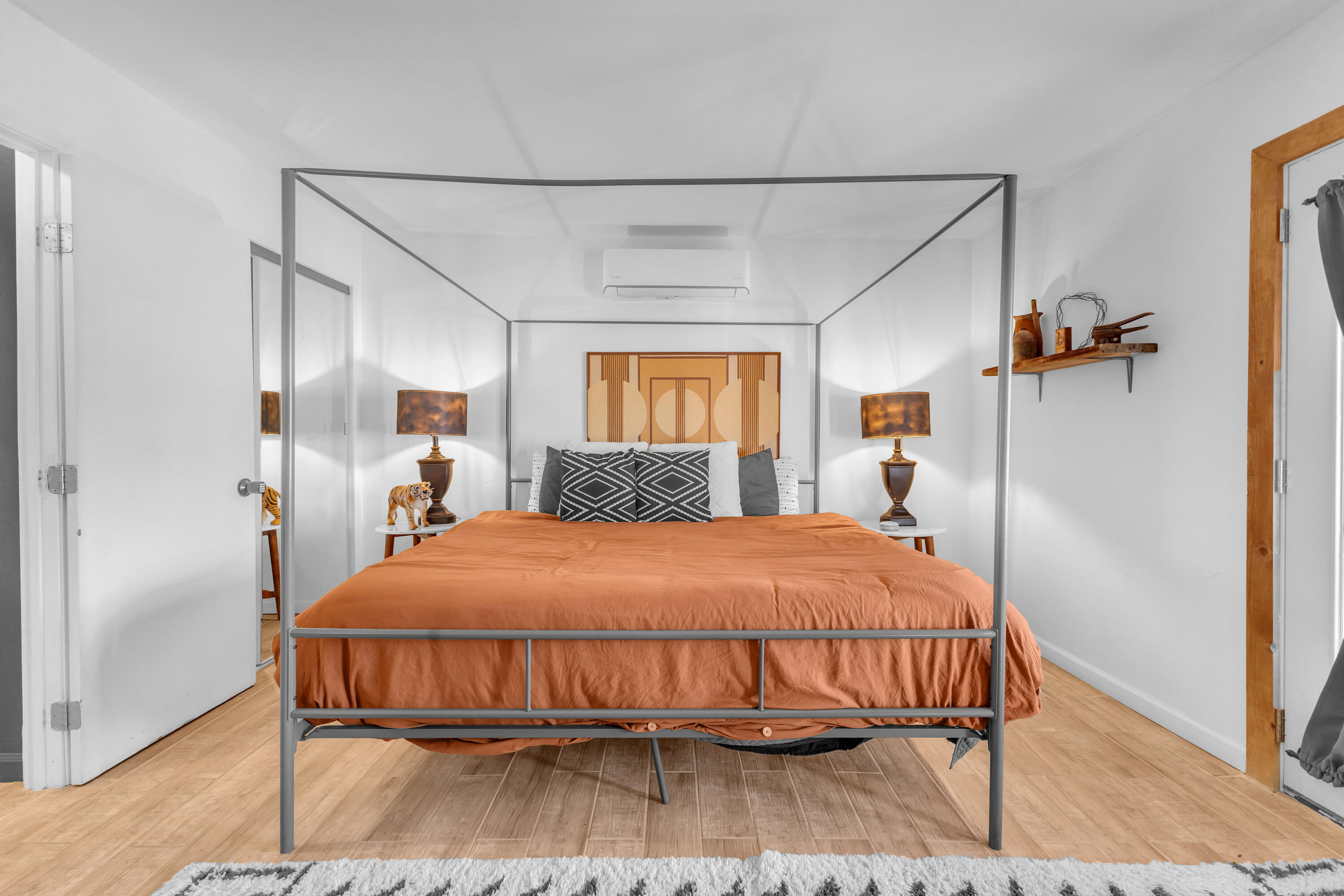 2642 Star Lane Joshua Tree, CA 92252 - Photo 30 of 76 a bedroom with a bed and wooden floor