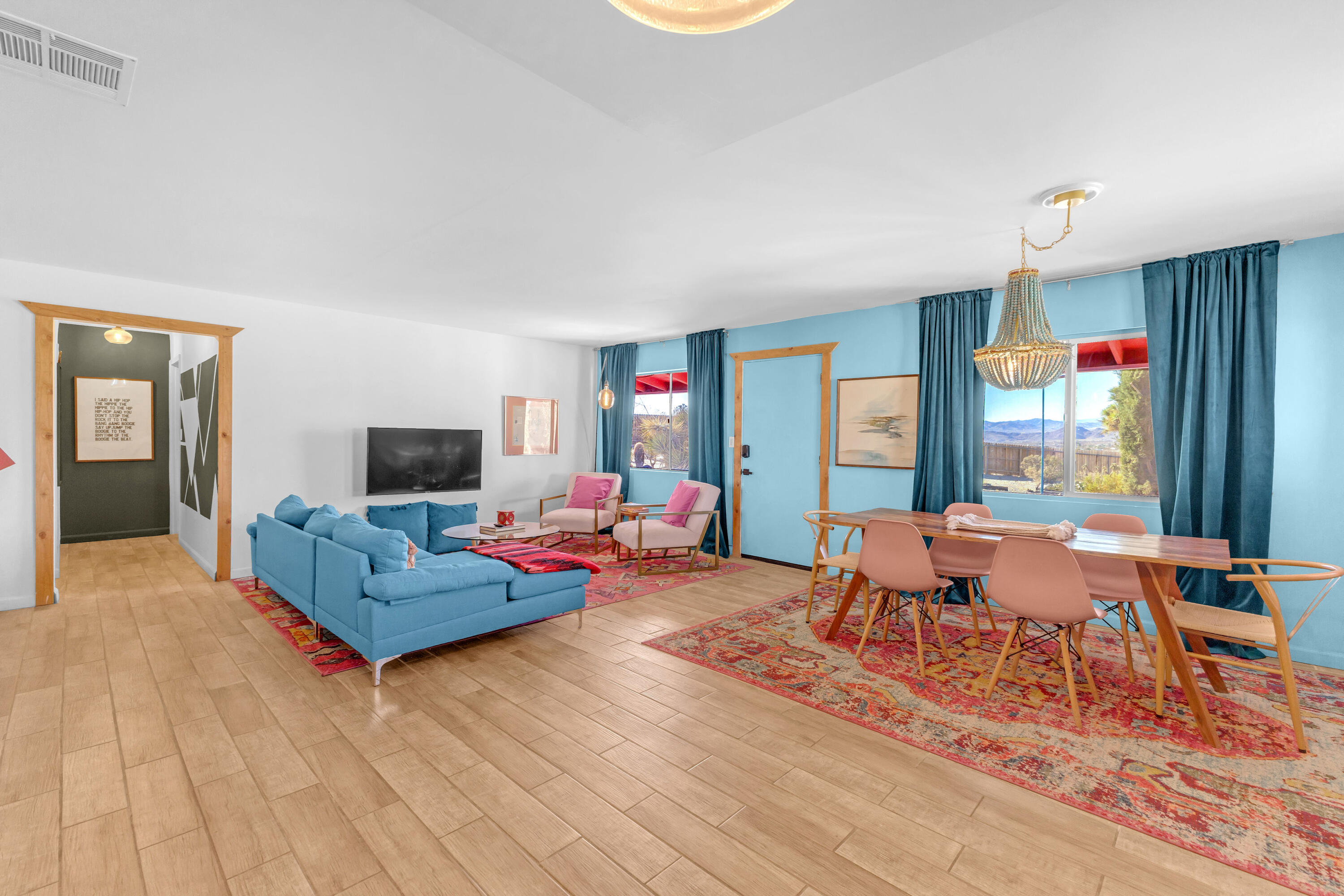 2642 Star Lane Joshua Tree, CA 92252 - Photo 3 of 76 a living room with furniture and a flat screen tv