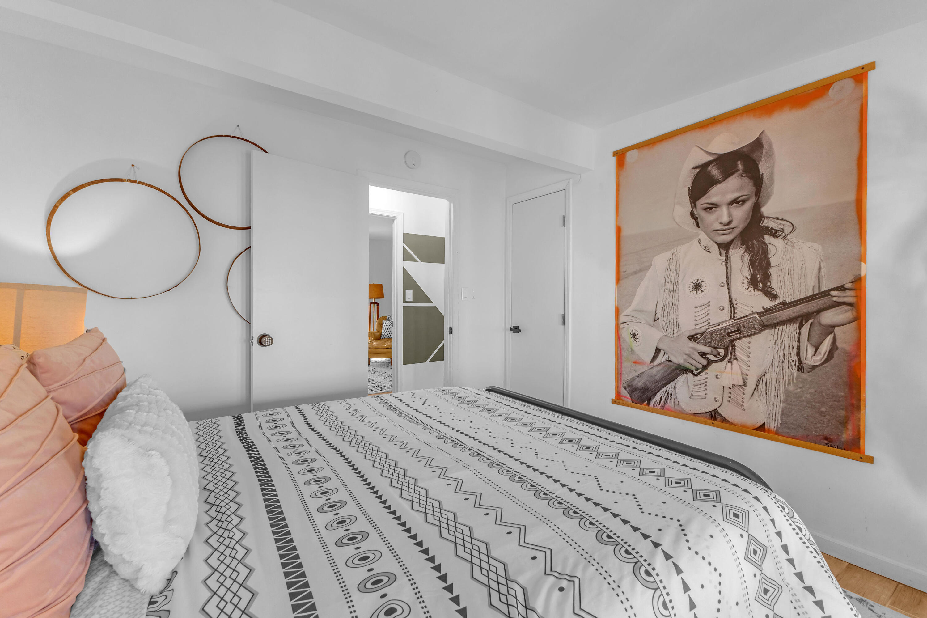 2642 Star Lane Joshua Tree, CA 92252 - Photo 35 of 76 a bedroom with a bed and a painting on the wall