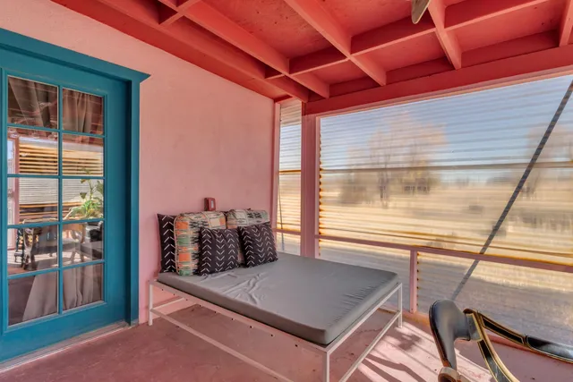 a view of a road with a building in the background