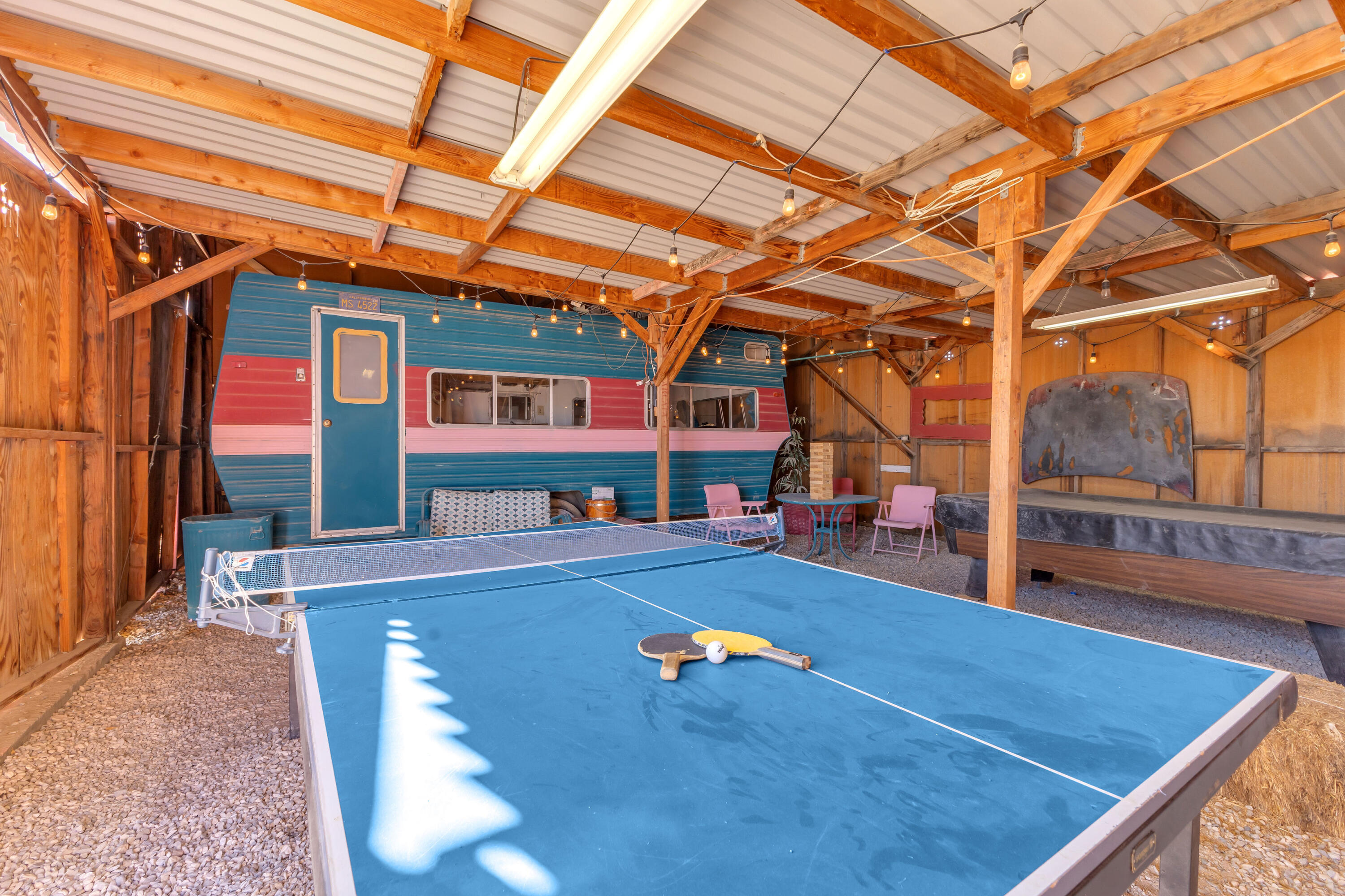 2642 Star Lane Joshua Tree, CA 92252 - Photo 57 of 76 a room with pool table and glass windows