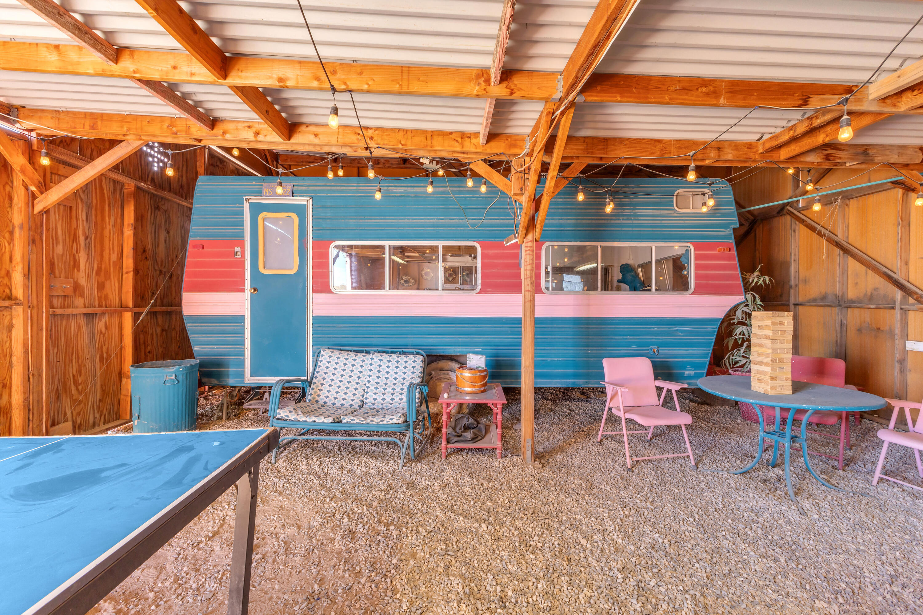 2642 Star Lane Joshua Tree, CA 92252 - Photo 59 of 76 a backyard of a house with wooden chairs