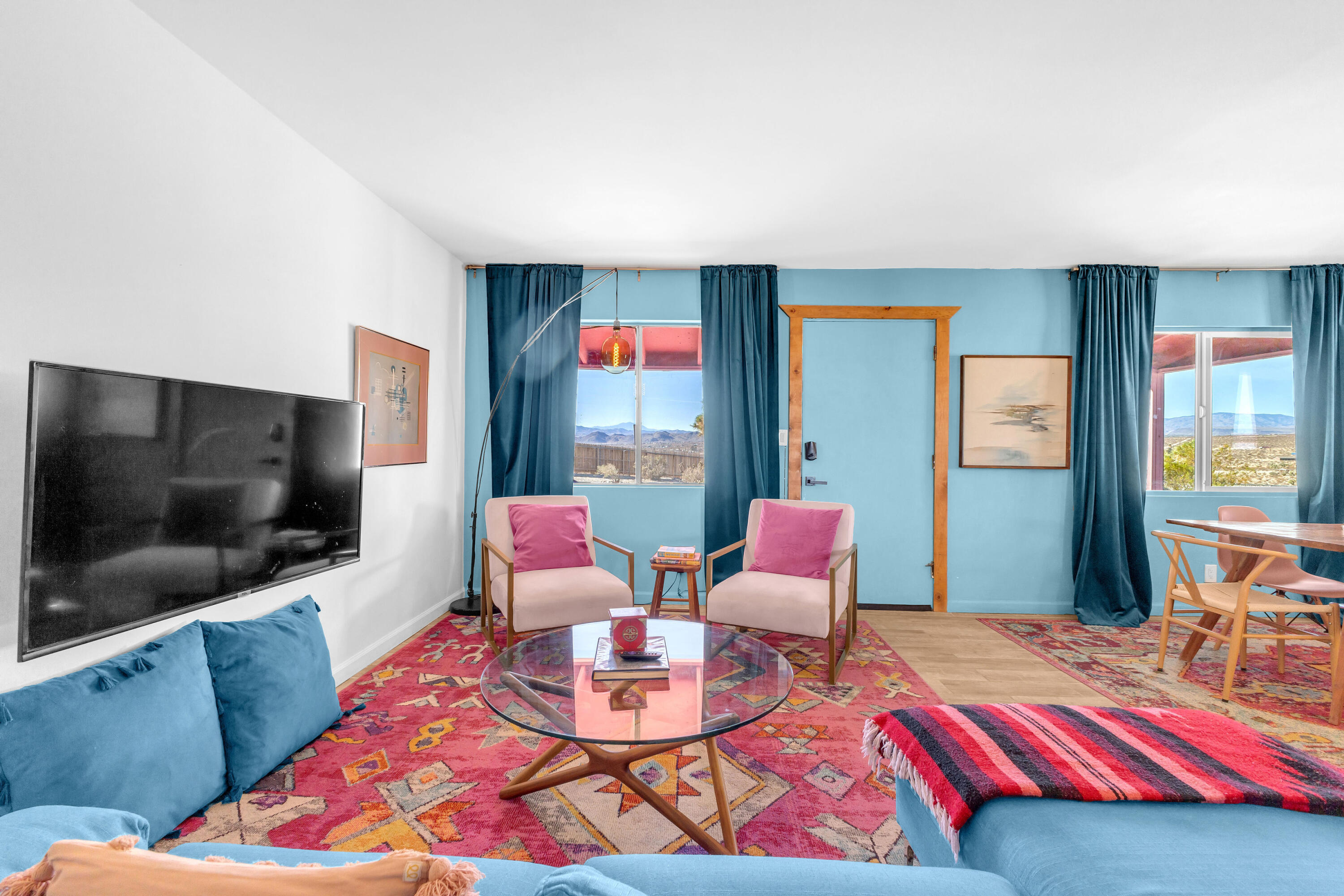 2642 Star Lane Joshua Tree, CA 92252 - Photo 8 of 76 a living room with furniture and a flat screen tv
