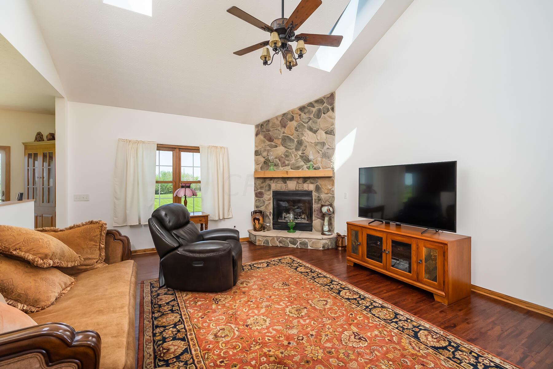 3807 North Section Line Road Radnor, OH 43066 - Photo 14 of 37 Great Room w/Stone Fireplace