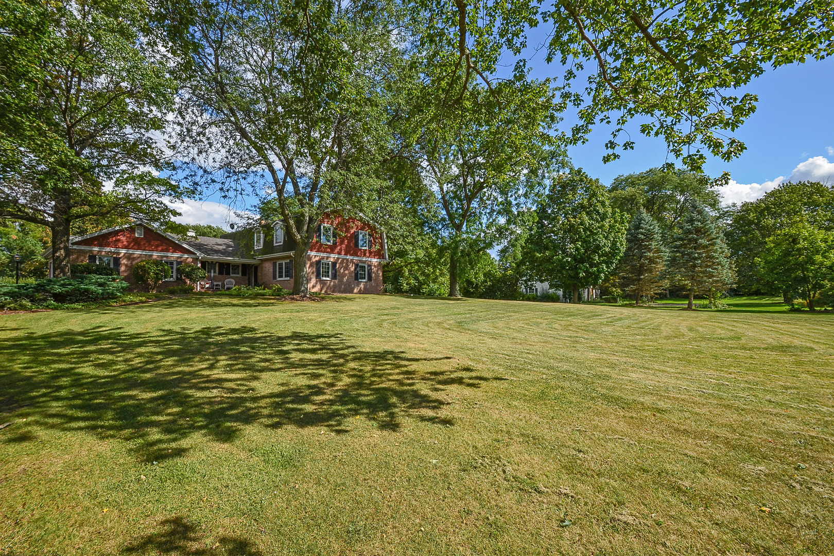 1455 Appleby Road Inverness, IL 60067 - Photo 2 of 16 a view of a field with large trees