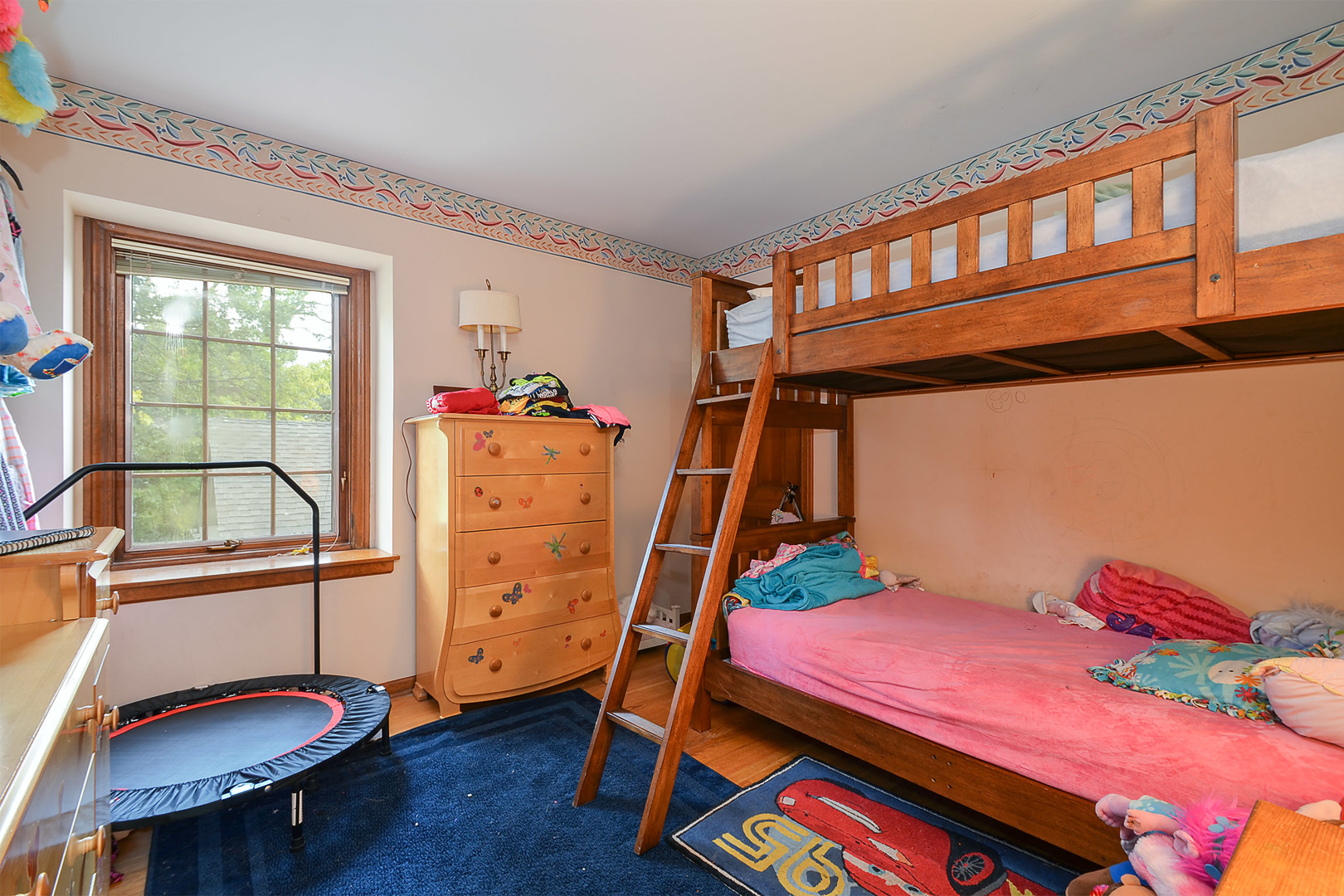1455 Appleby Road Inverness, IL 60067 - Photo 14 of 16 a bed room with a bed and a window