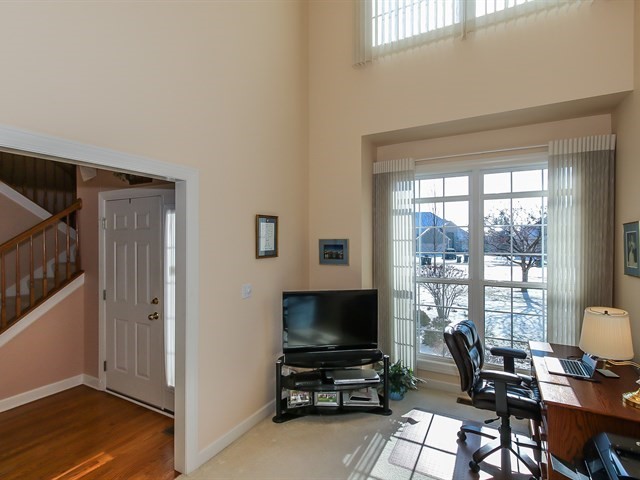 804 Stone Canyon Circle Inverness, IL 60010 - Photo 13 of 30 a view of a livingroom with workspace and a window
