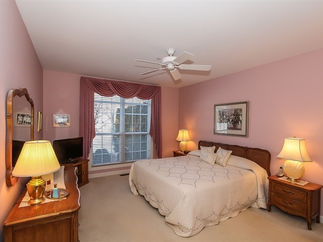 804 Stone Canyon Circle Inverness, IL 60010 - Photo 14 of 30 a bedroom with a bed and a window